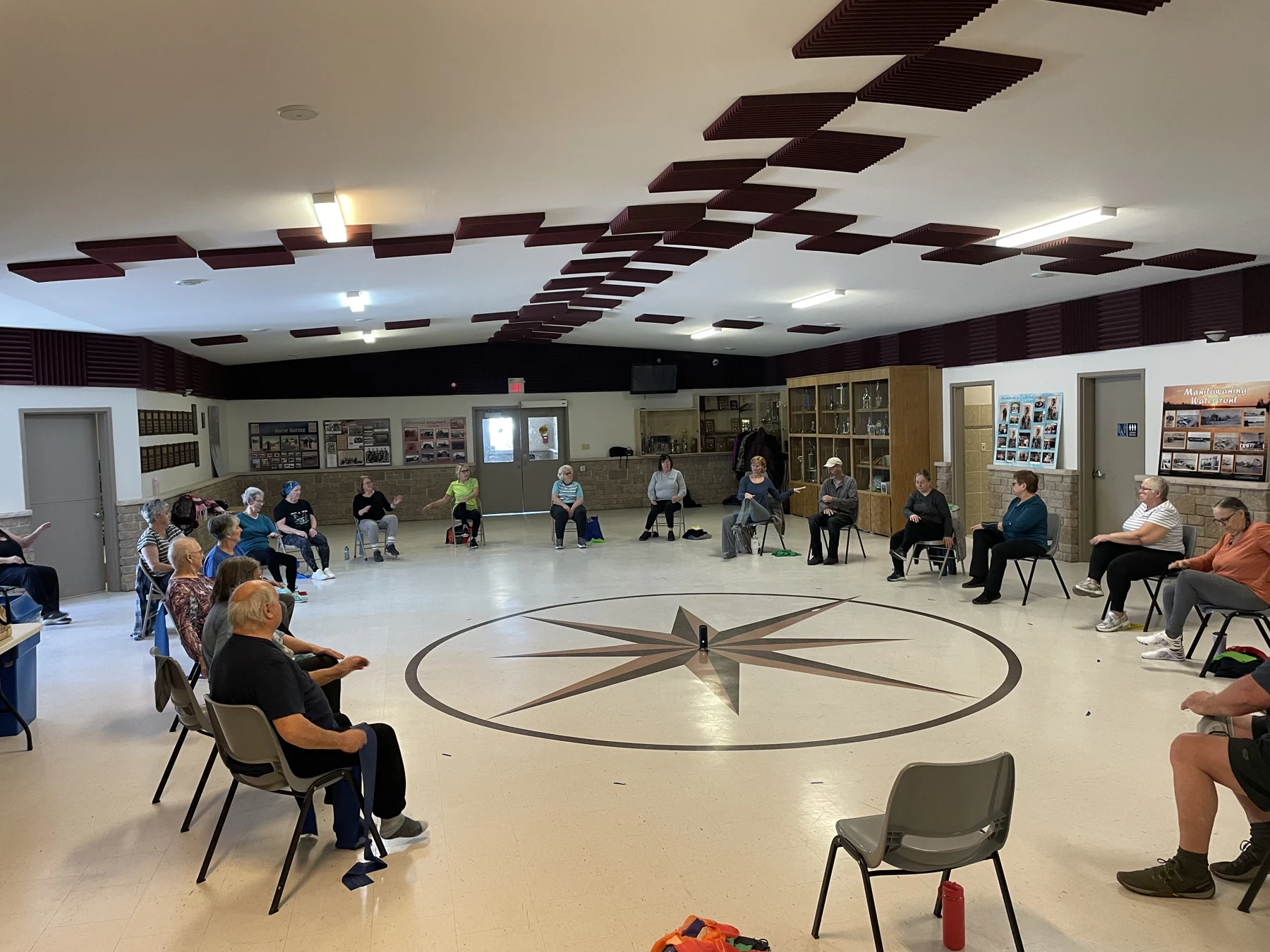 Participants exercising with chairs in Kelly’s Assiginack class